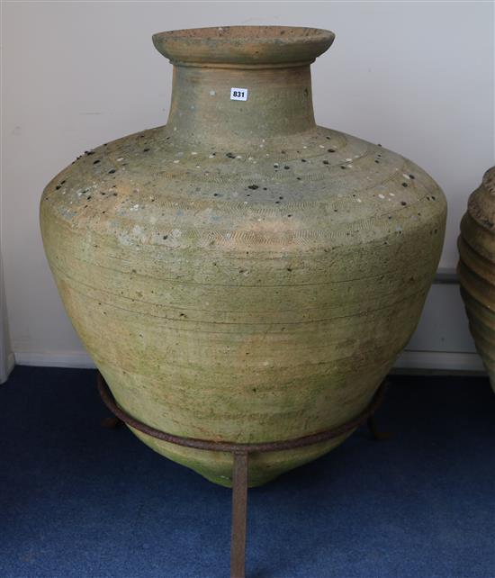 A large terracotta urn on iron stand, H.110cm